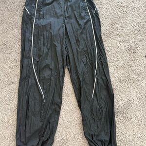 lululemon athletica Black Joggers with White Accents . Fits a size small/medium